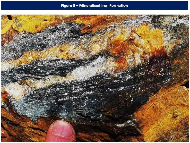 Close-up of mineralized iron formation from East Porphyry Zone, showing coarse-grained pyrite and quartz veinlets replacing magnetite bands. Grab sample 447959 returned 14.9 gpt gold.